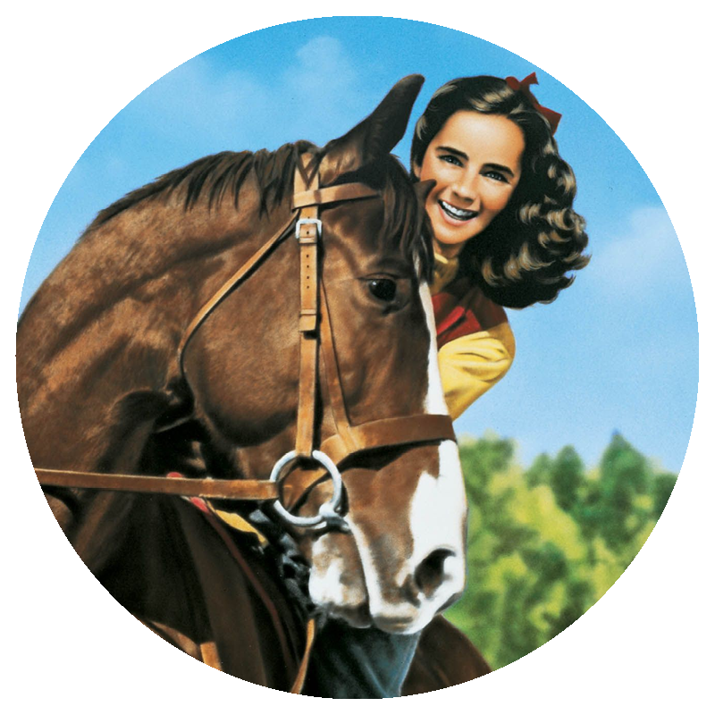 young Elizabeth Taylor smiles beside a horse